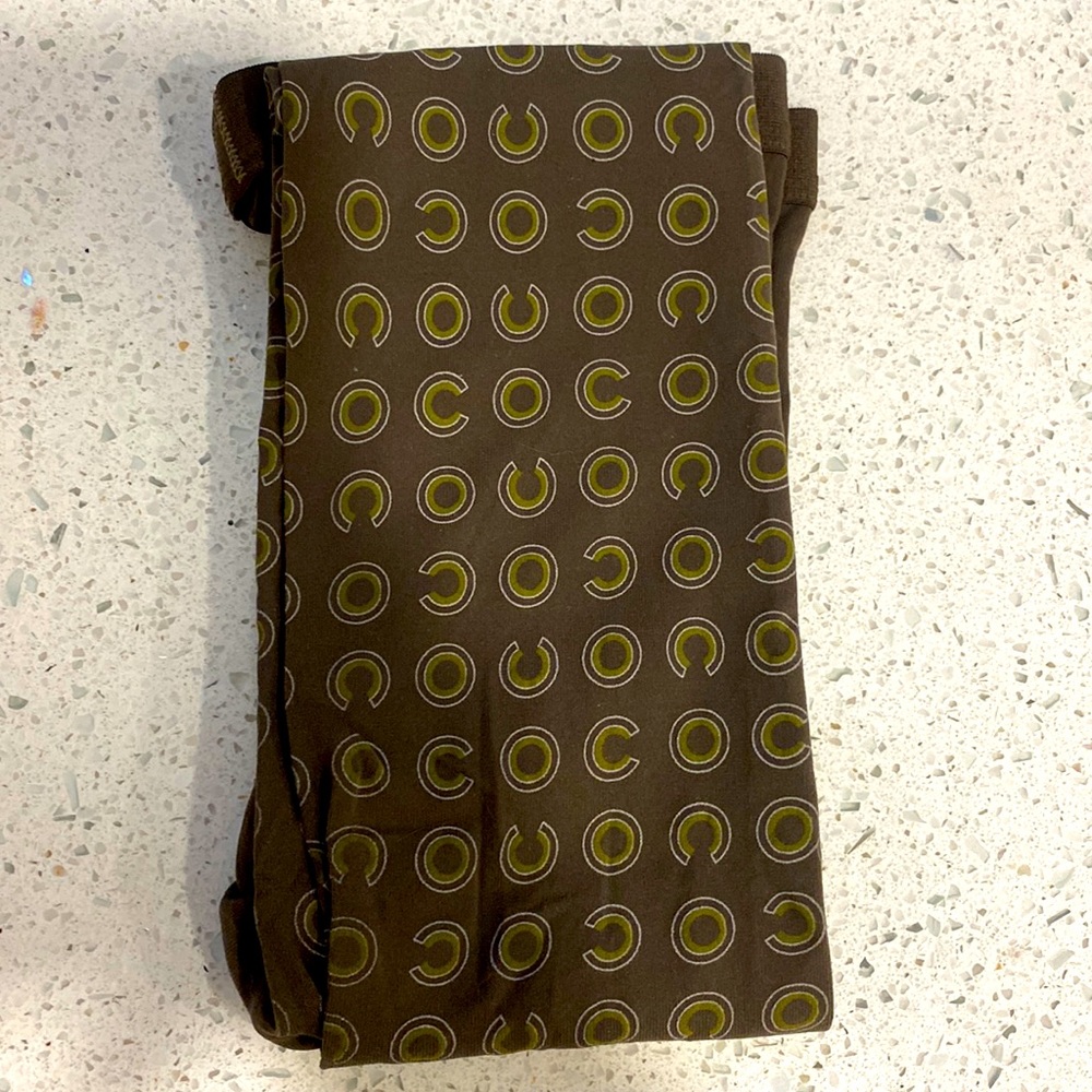 Chanel khaki tights with coco all over